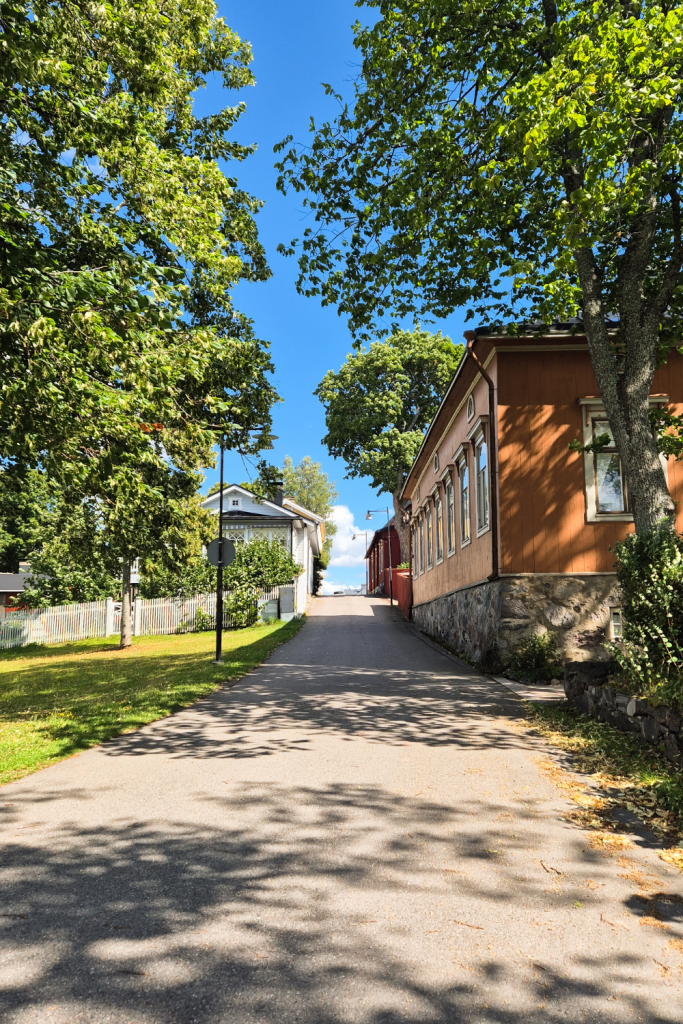 Charming street view in Tammisaari, Finland with historic buildings and summer vibes.