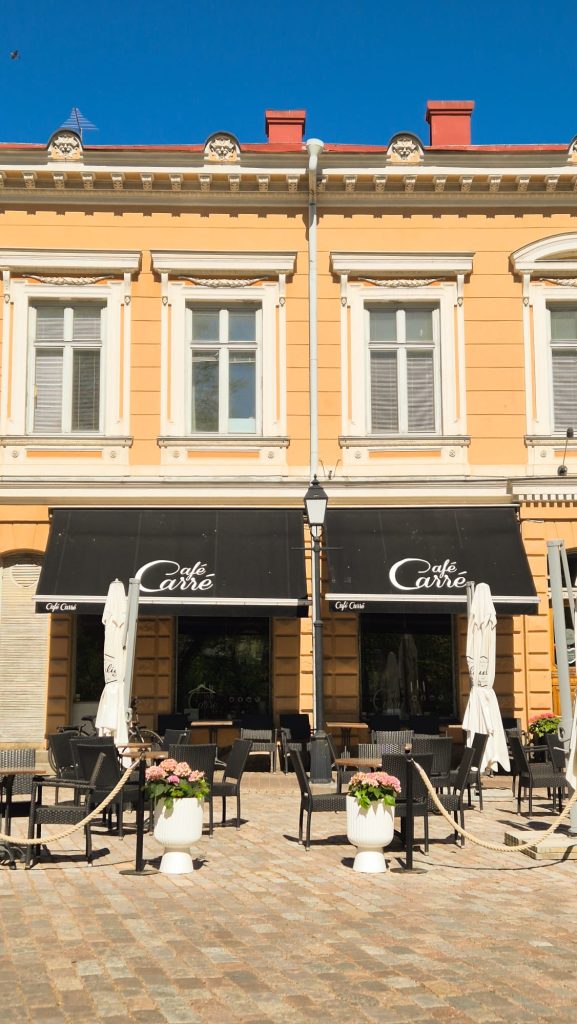 Exterior view of Cafe Carre in Turku, Finland on a sunny day.