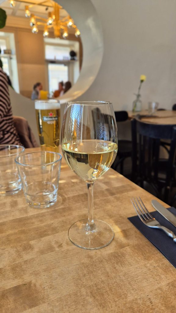 Glass of white wine at Blanco restaurant in Turku, Finland.