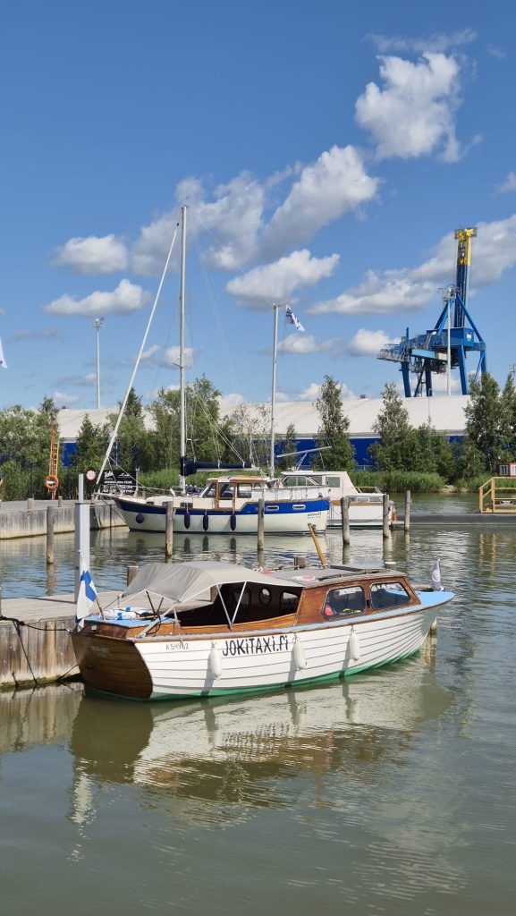Turku Archipelago view from Ruissalo Shipyard with boats docked, summer in Finland.