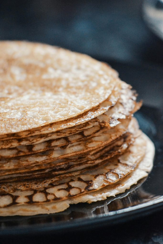 Summer in Finland: classic thin pancakes cooked over a campfire