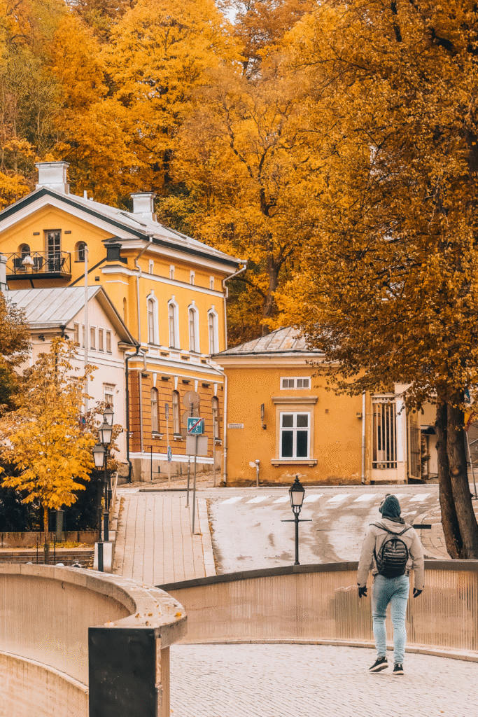 Autumn landscape in Turku city center with vibrant orange and yellow trees.
