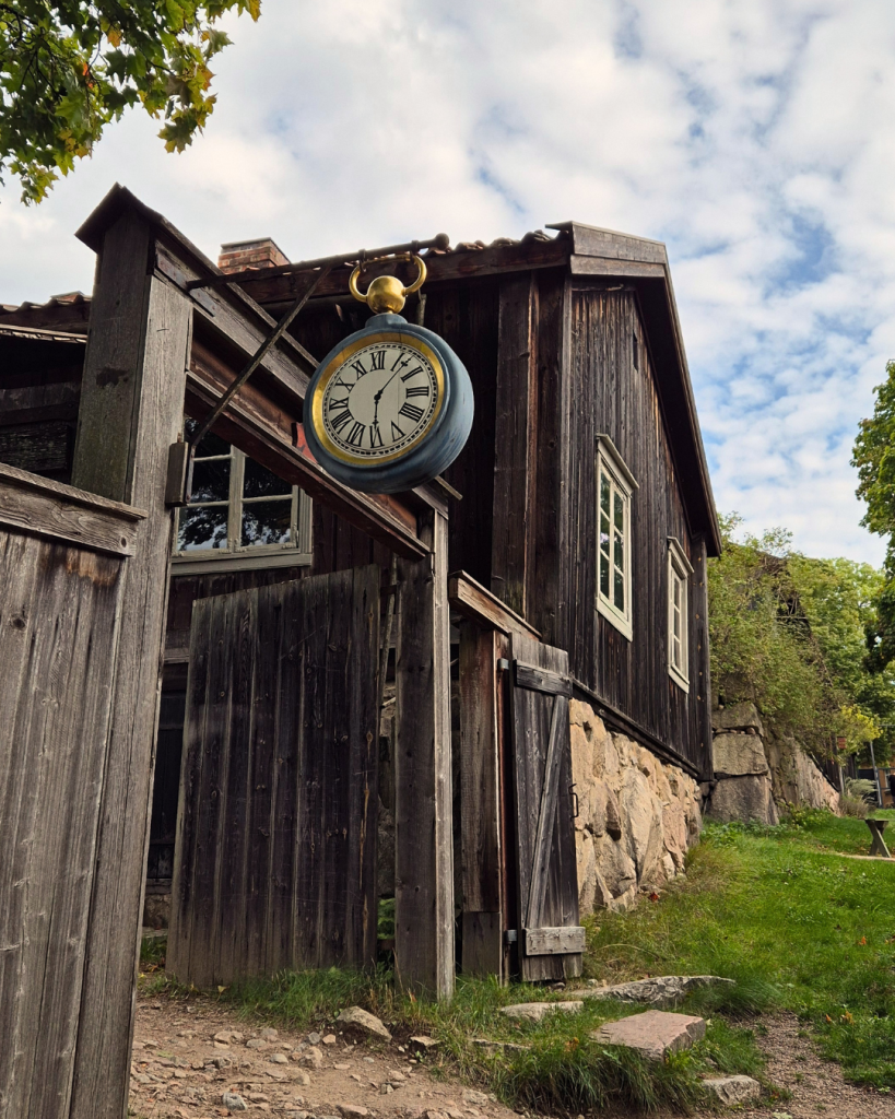 Historic wooden buildings at Luostarinmäki Handicrafts Museum in Turku, Finland.
