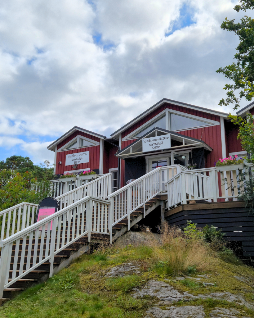 Exterior of a local shop in Nauvo, Finland, with its traditional building and shop entrance.