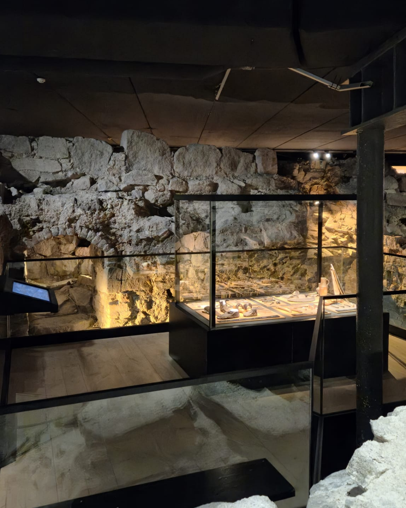 Historic underground ruins and medieval walls inside Aboa Vetus museum in Turku, Finland.