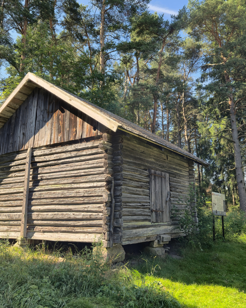 Traditional wooden house at Kuralan Kylämäki open-air museum in Turku, Finland.