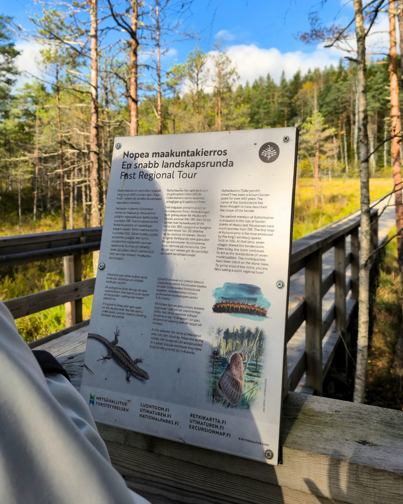 Information board explaining the history of the Kuhankuono boundary stone in Southwest Finland.